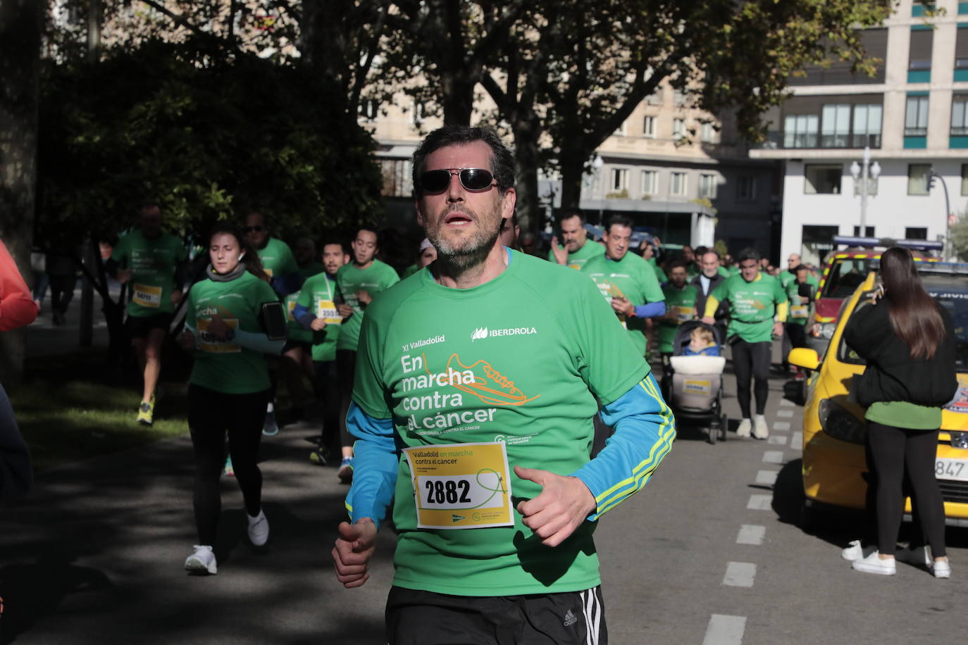 Fotos: La marcha contra el cáncer llena Valladolid de verde