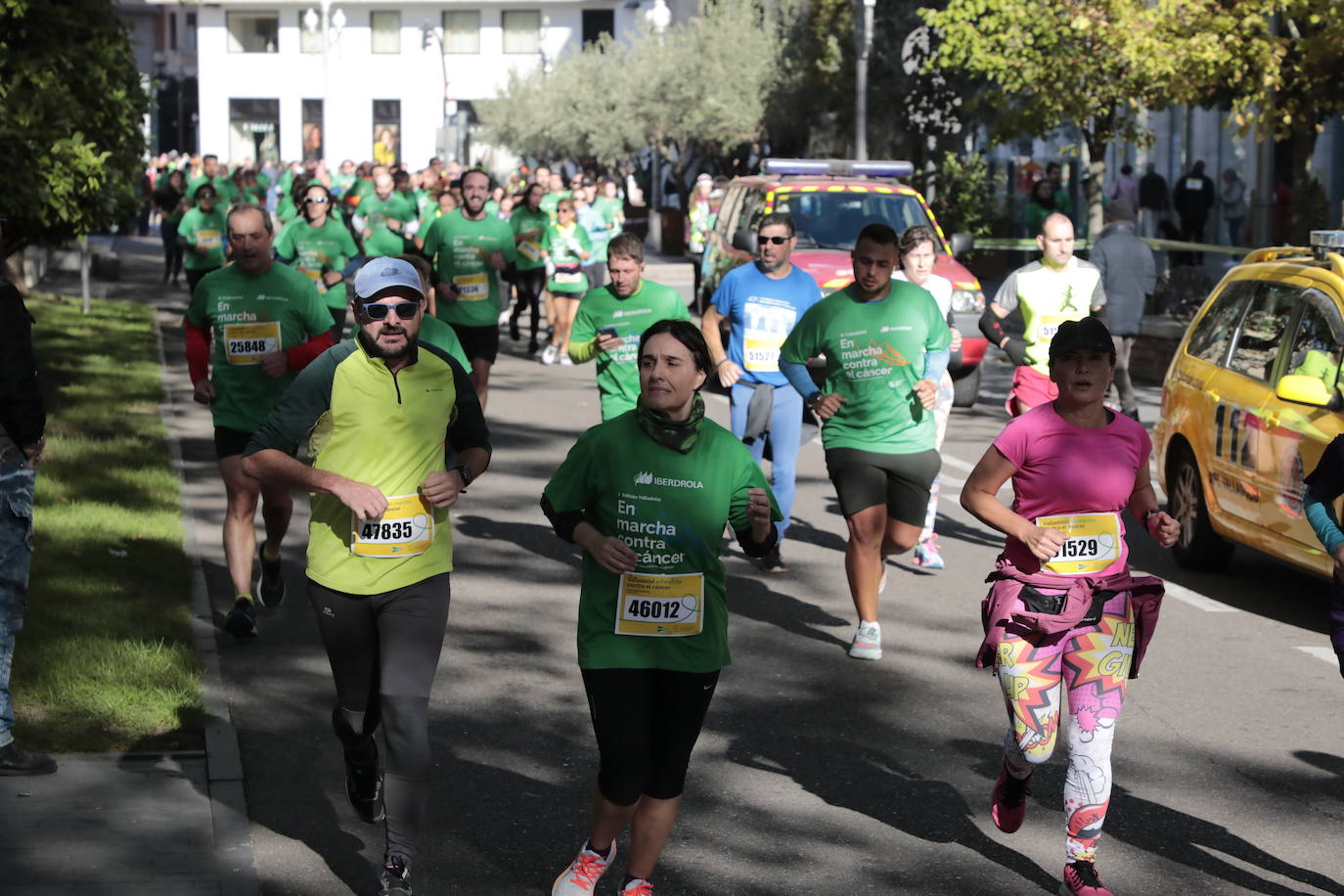 Fotos: La marcha contra el cáncer llena Valladolid de verde