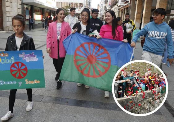 Pancartas que conmemoran el Día del Pueblo Gitano y pétalos al Carrión.