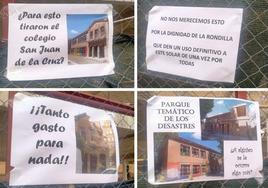 Carteles colocados en las verjas que protegen la obra paralizada del antiguo San Juan de la Cruz.