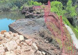 Precintos y mallas en la presa de Navafría.