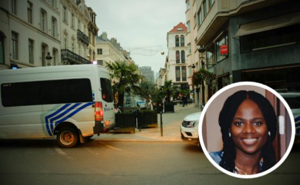 Vehículos policiales en la Rue du Midi, cerca del lugar del crimen en Bruselas. 