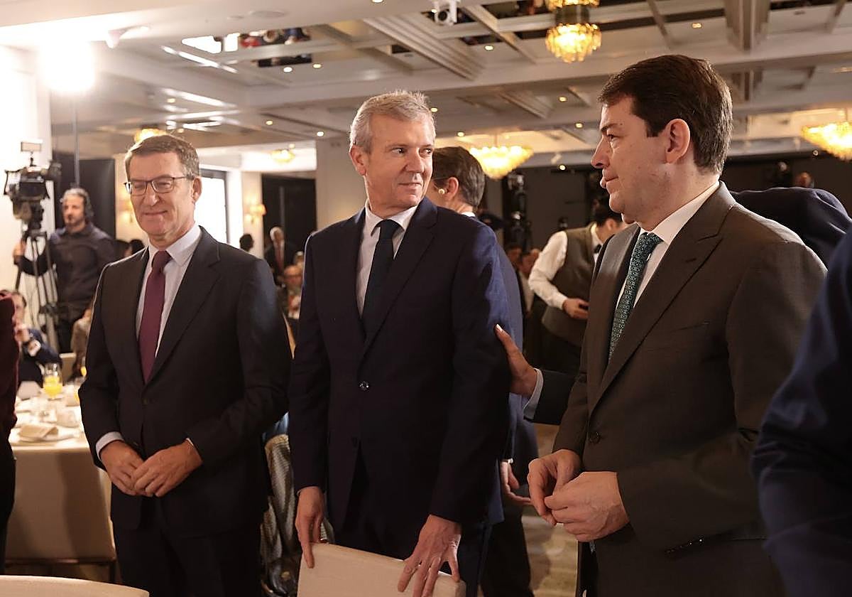 Feijóo, Rueda y Mañueco, en un acto en Madrid de apoyo al presidente de la Xunta.