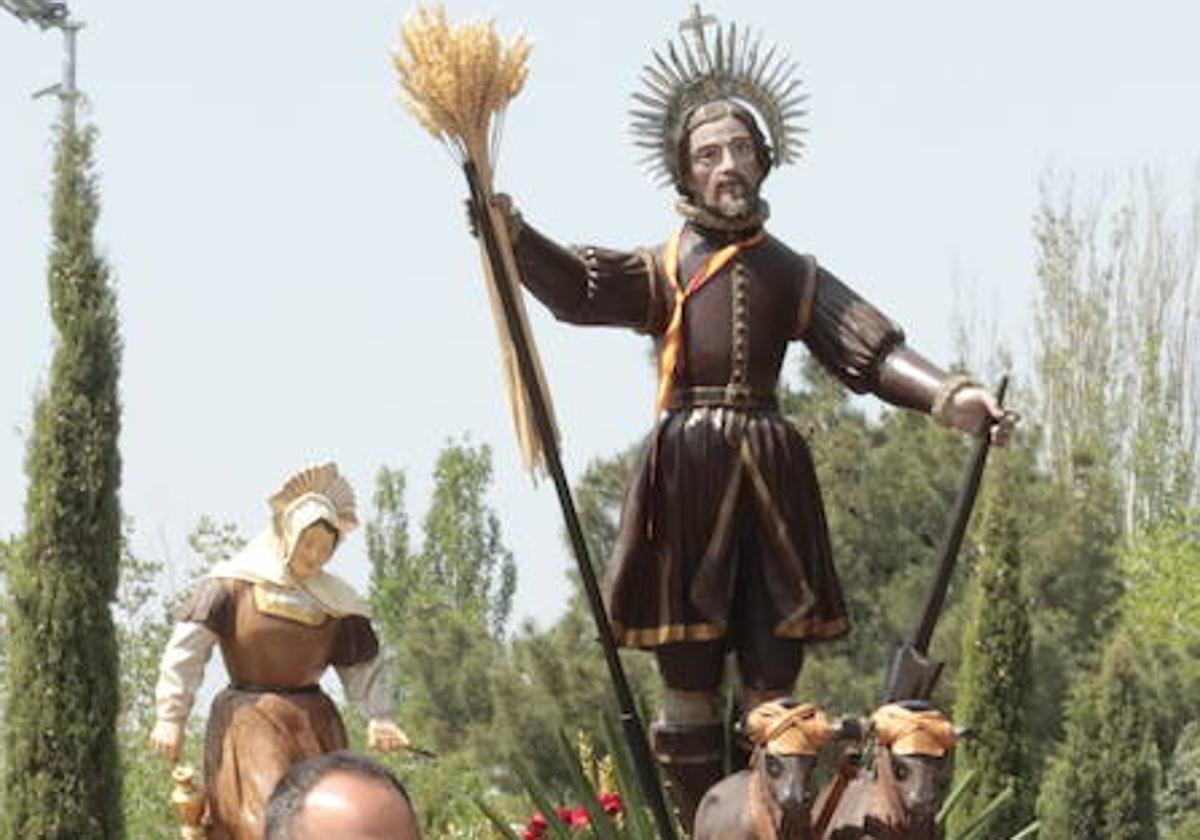 San Isidro y Santa María de la Cabeza, en procesión.