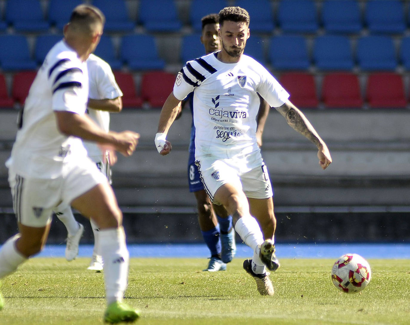 Fotografías del partido entre la Segoviana y el Ourense