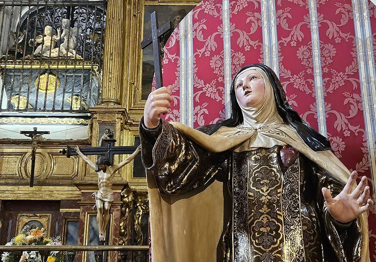 Ana de Jesús, ante el sepulcro de Santa Teresa en Alba (Padres Carmelitas. Medina del Campo).