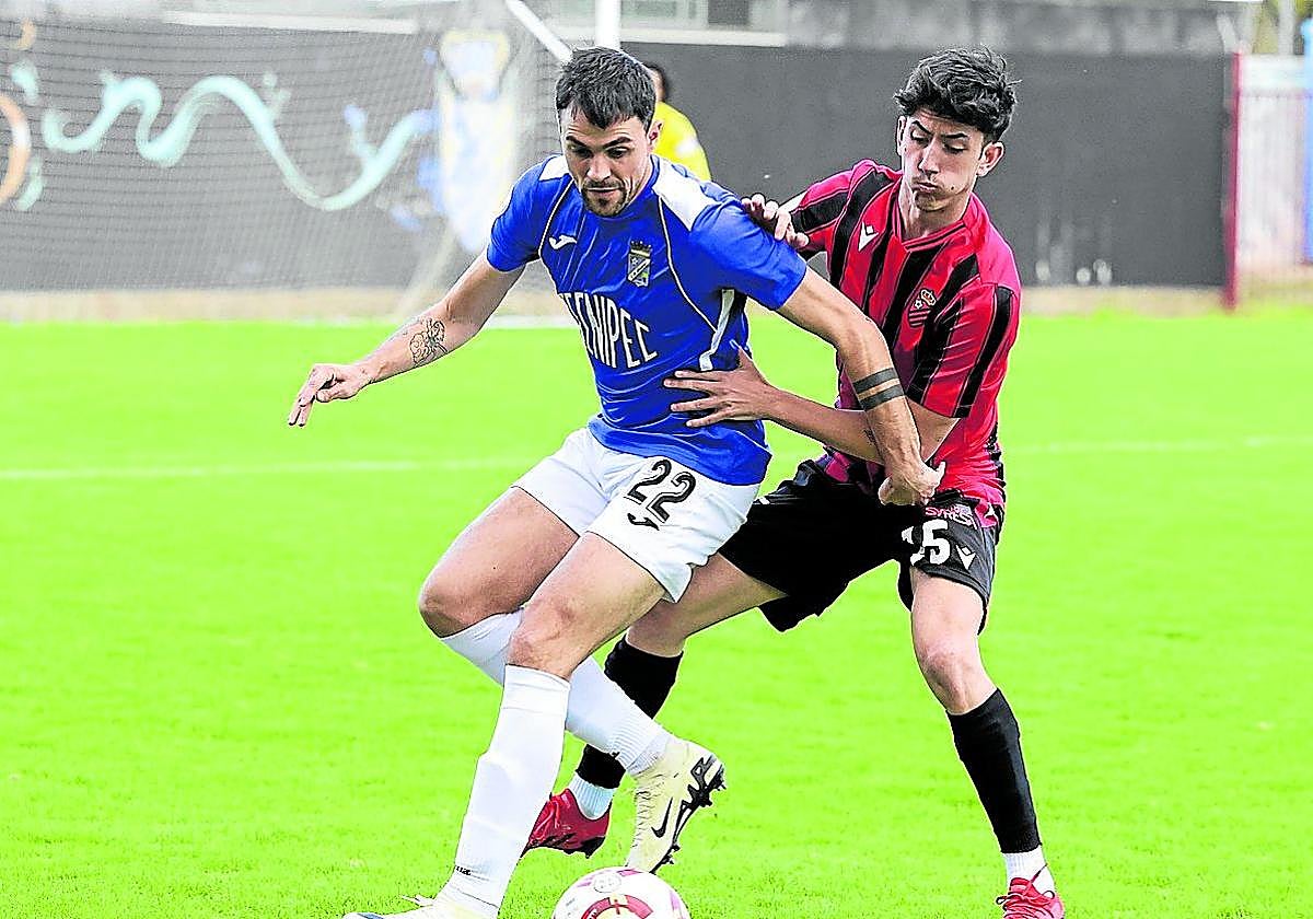 Kuko, en una acción de partido.