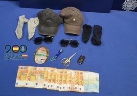 Objetos y dinero intervenidos por la Policía Nacional.