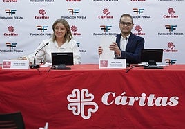 La secretaria general de Cáritas, Natalia Peiró, y el secretario técnico de la fundación FOESSA, Raúl Flores, presentan los resultados del IX Informe.