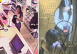 Dos de las personas detenidas en Burgos, haciendo uso de lo sustraído a las víctimas.