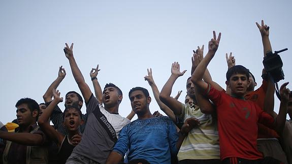 Gazatíes celebran el alto el fuego. 