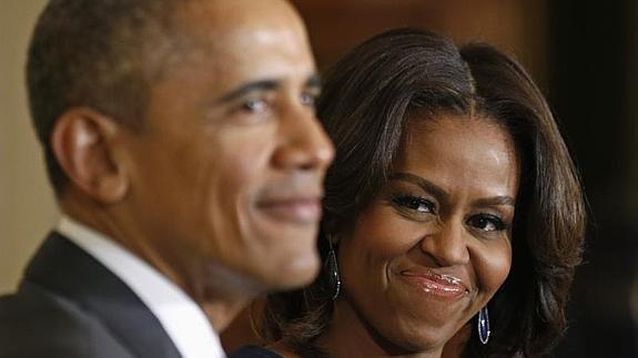 Obama con su mujer, Michelle. 