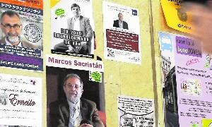 Carteles de los candidatos. / R. O.