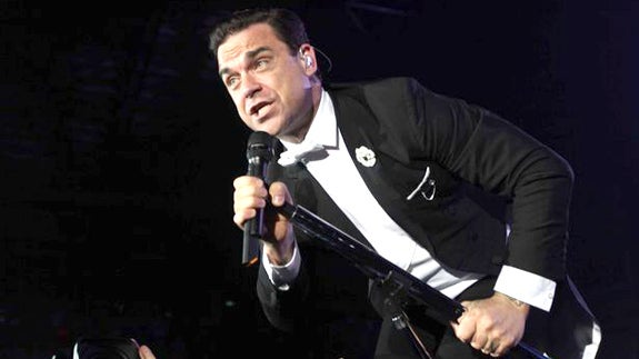 Robbie Williams en un concierto