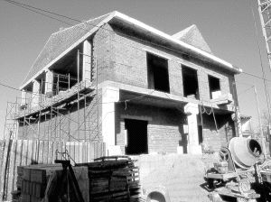 Obras de construcción de un edificio con cargo a los planes provinciales. / EL NORTE