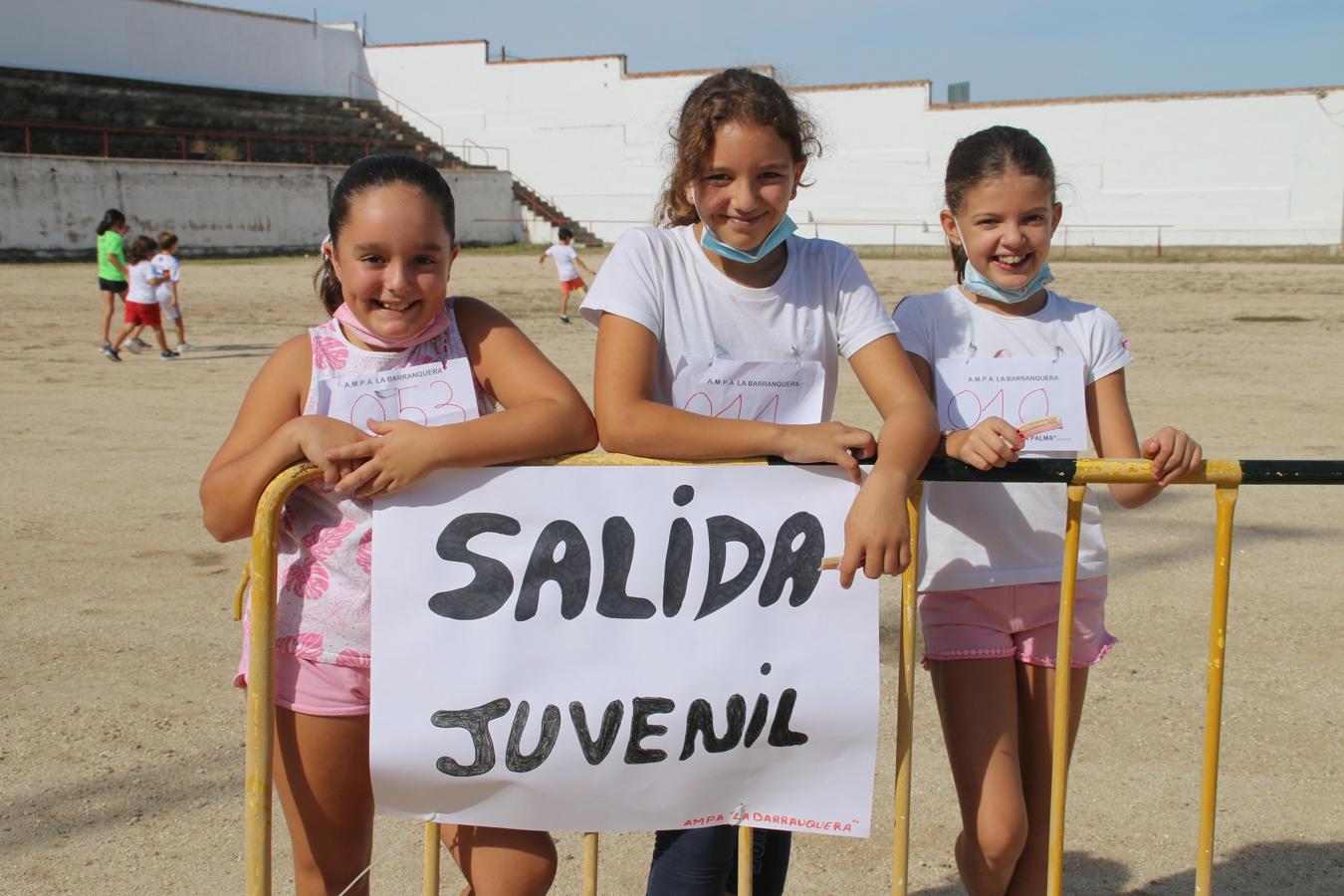 Participantes en la carrera solidaria por los afectados por el volcán canario. 