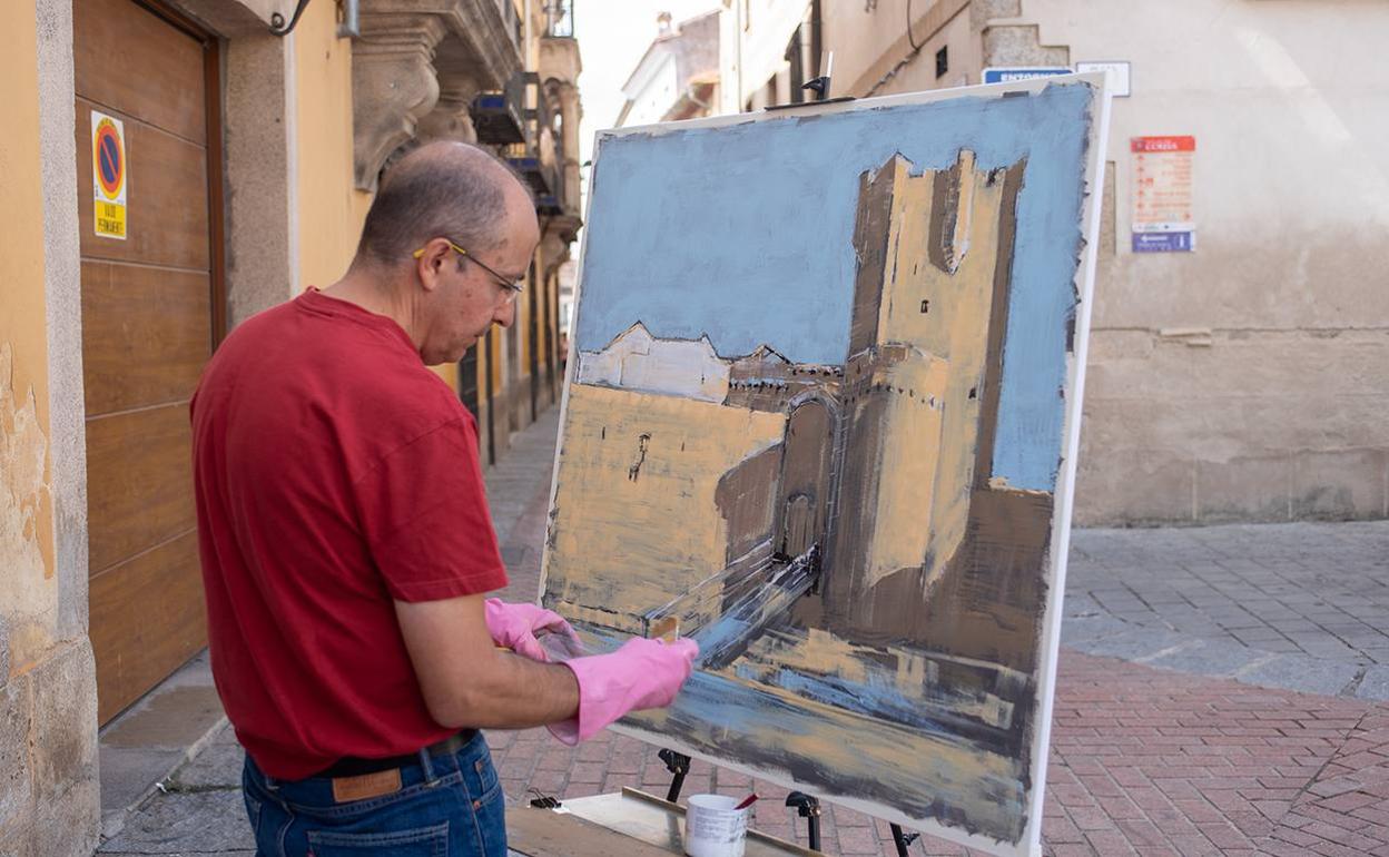 Pintando el castillo en la plaza de la Cava
