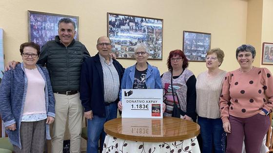 La Asociación de Mujeres de Coria y comarca dona 1.183 euros al colectivo AXPAY