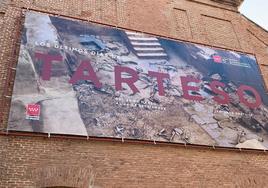 Cartel anunciador de la muestra en el museo arqueológico de la Comunidad de Madrid.