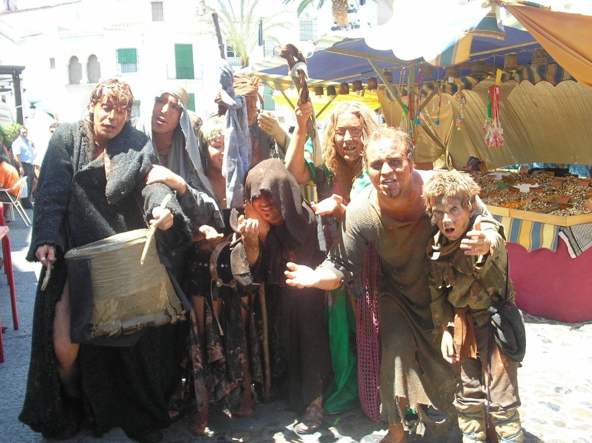 Escena de animación de calle en la fortaleza templaria.