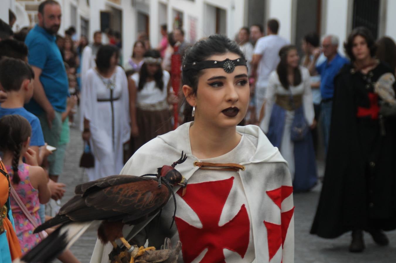 Escena de animación de calle en la fortaleza templaria.