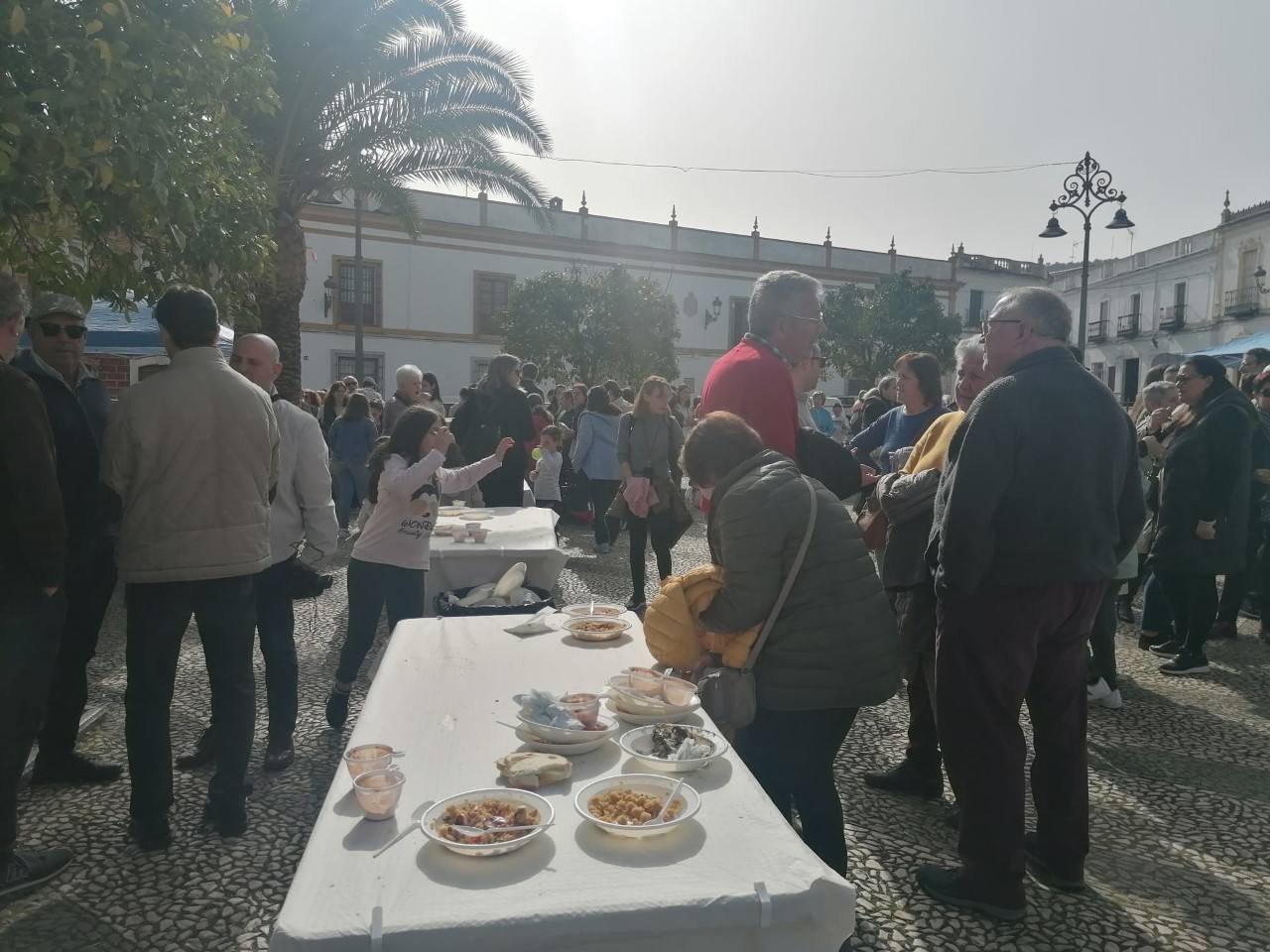 Reparto de migas y sardinas