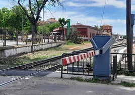 Valla bajada en el paso a nivel