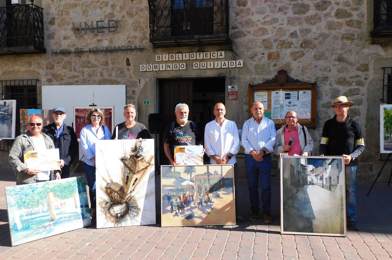 Los ganadores con los organizadores y el alcalde