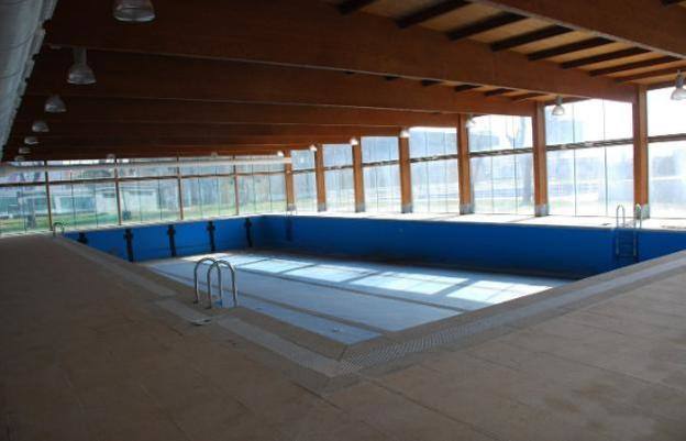 La piscina climatizada. 