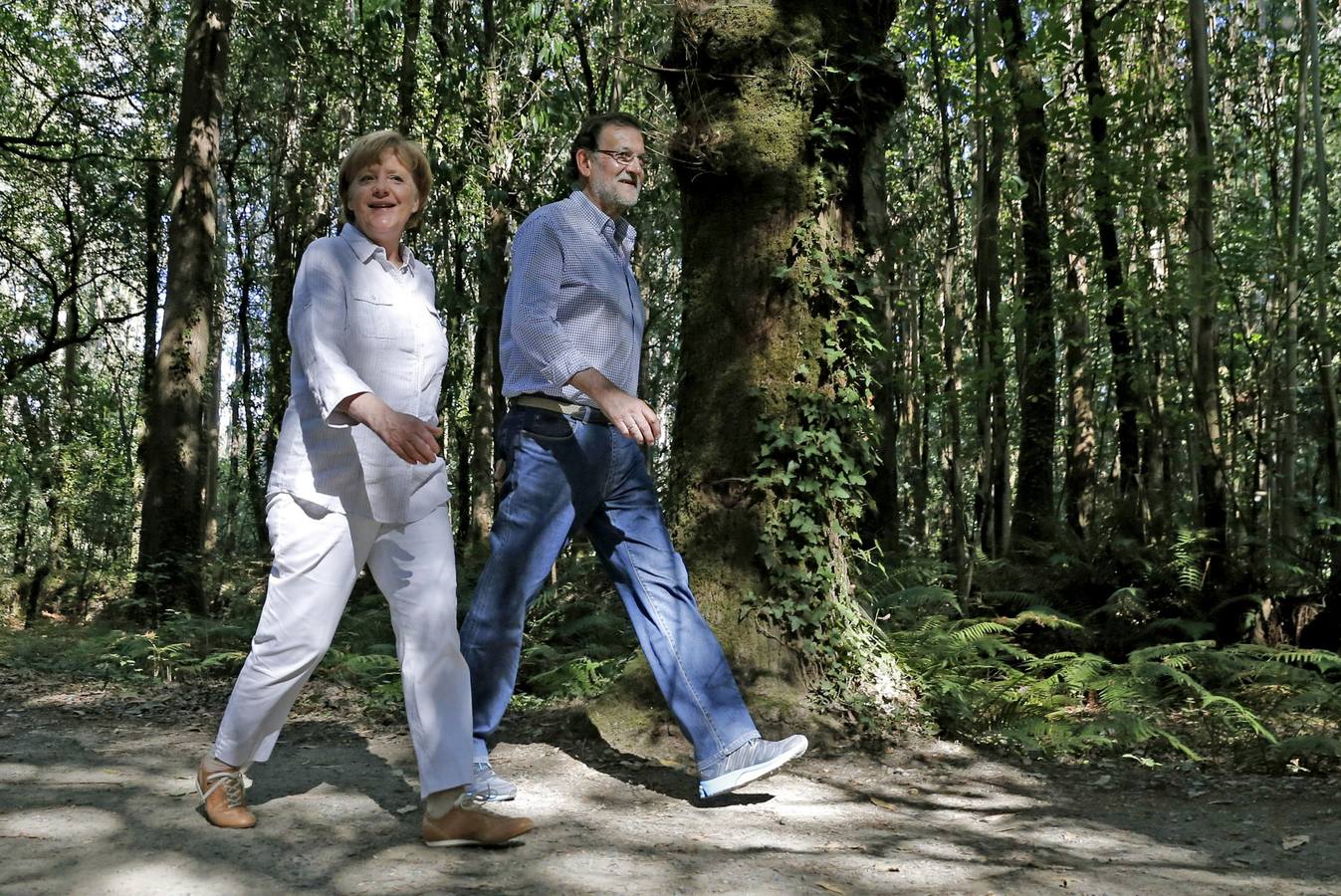 Angela Merkel y Mariano Rajoy recorren parte del Camino de Santiago.