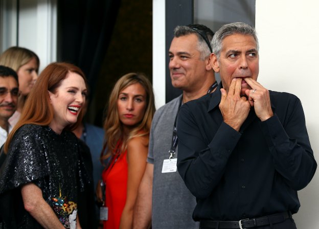 Julianne Moore y George Clooney, ayer en la Mostra de Venecia. 