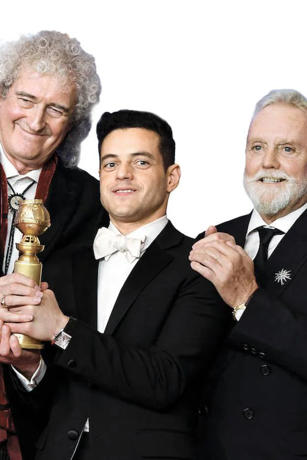 Rami Malek, galardonado como mejor actor por 'Bohemian Rhapsody', junto a los miembros de la mítica banda Queen Brian May y Roger Taylor. :: afp