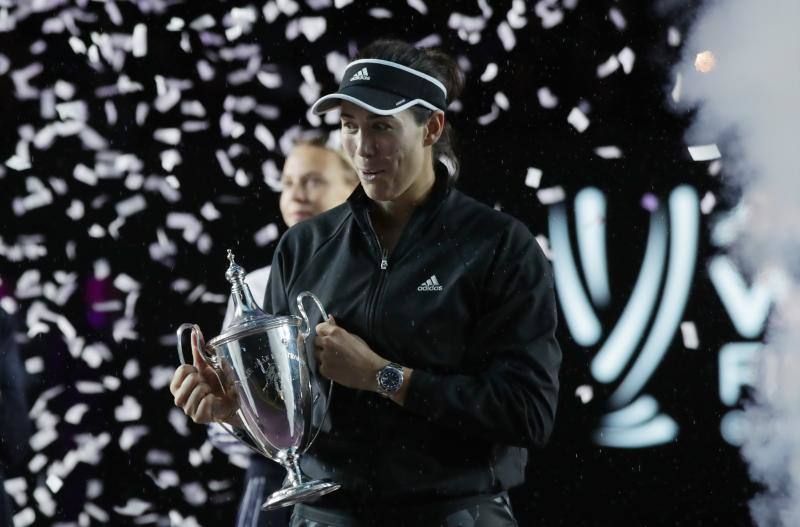 Garbiñe Muguruza celebra el triunfo de maestra. 