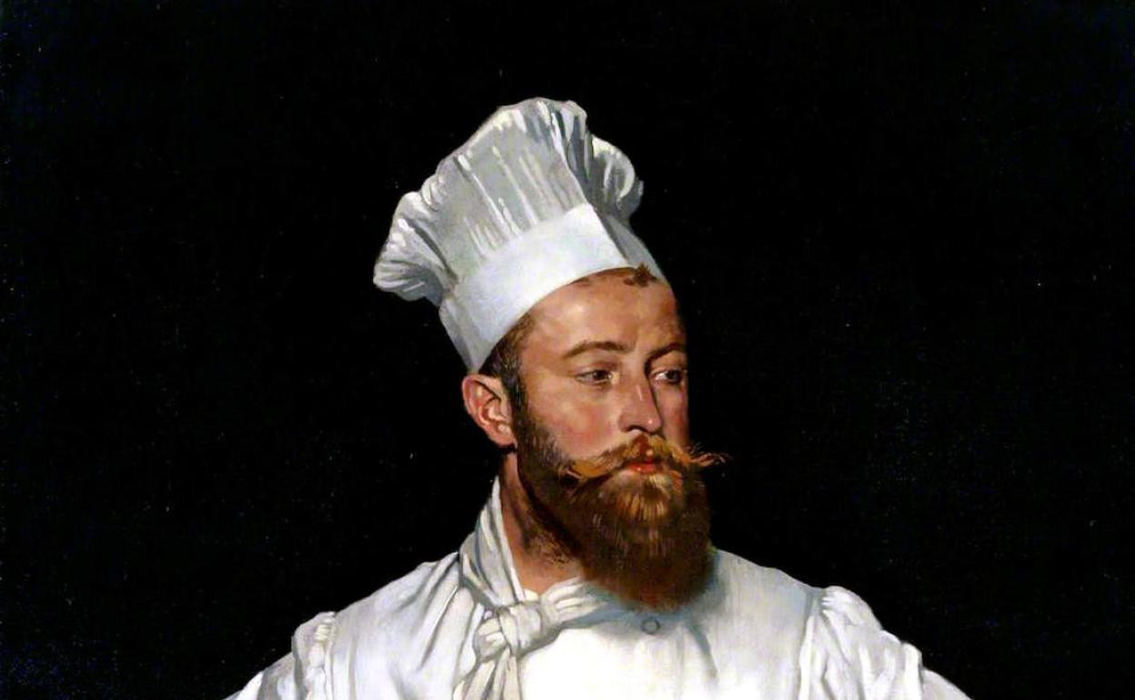 Retrato de un cocinero francés con el clásico uniforme de color banco y el gorro.