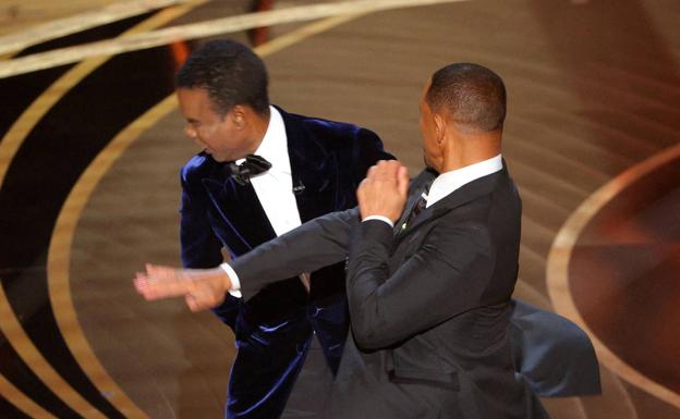 'CODA' wins on a night marked by Will Smith's punch to Chris Rock