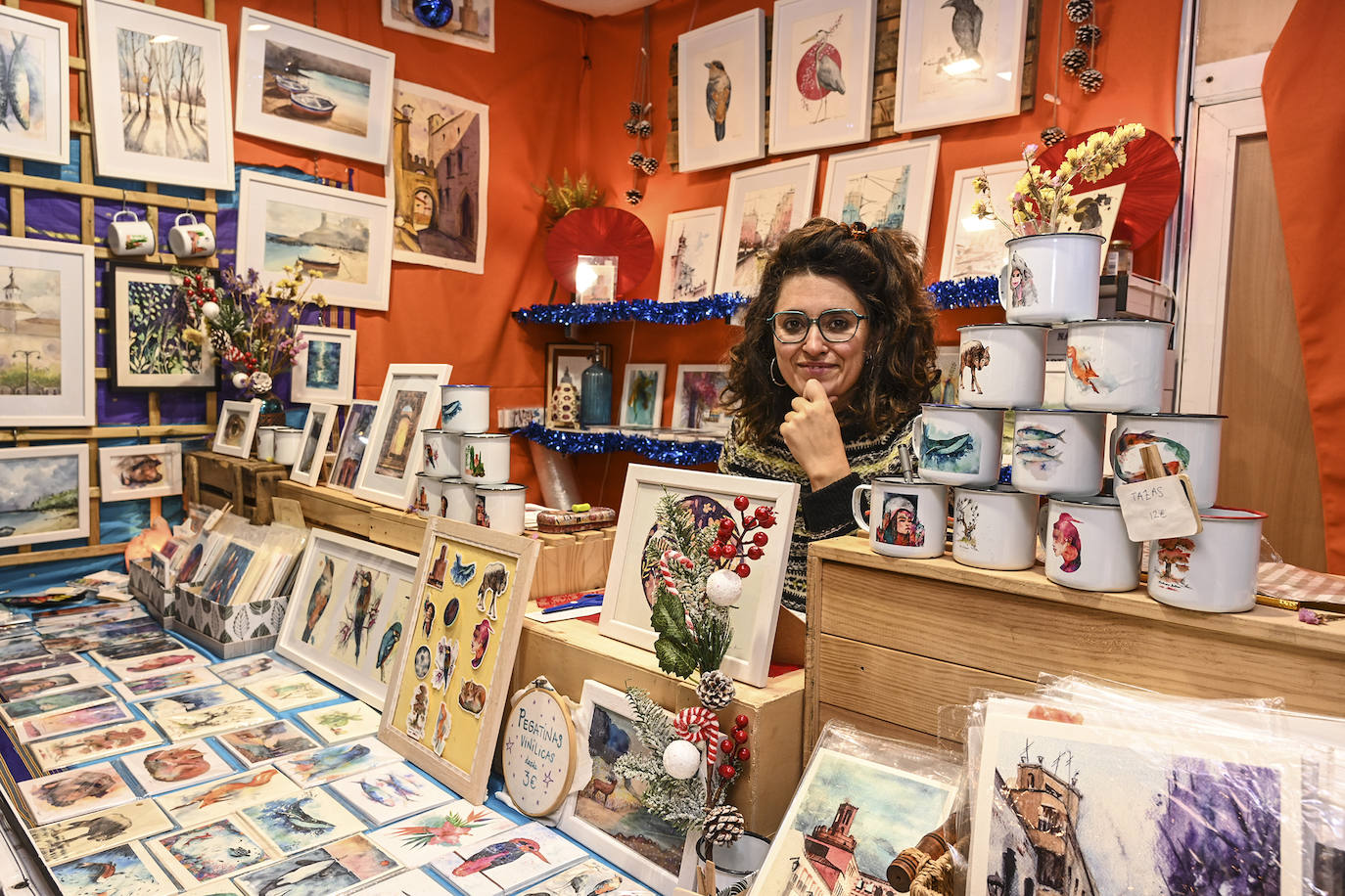 La artista Blanca Ambel vuelve con un puesto de acuarelas originales y reproducciones con escenas de naturaleza y paisajes de Badajoz