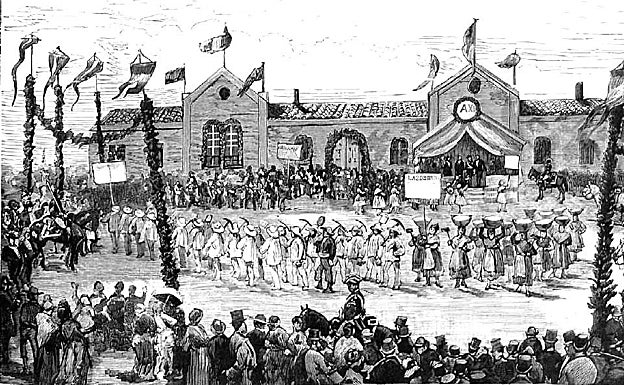 Desfile de los 500 trabajadores de las cuatro minas de Cáceres delante de Alfonso XII. 