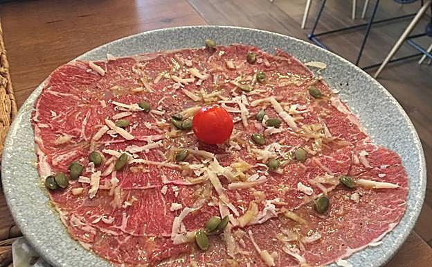 Carpaccio de presa ibérica. 
