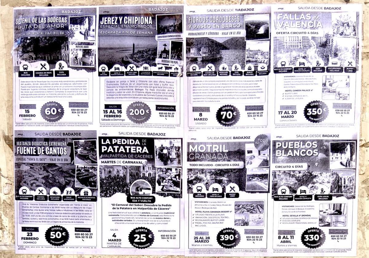 Anuncios de excursiones en un muro de Santa Marina Alta.