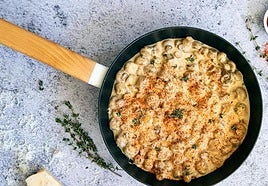 Champiñones con nata y queso