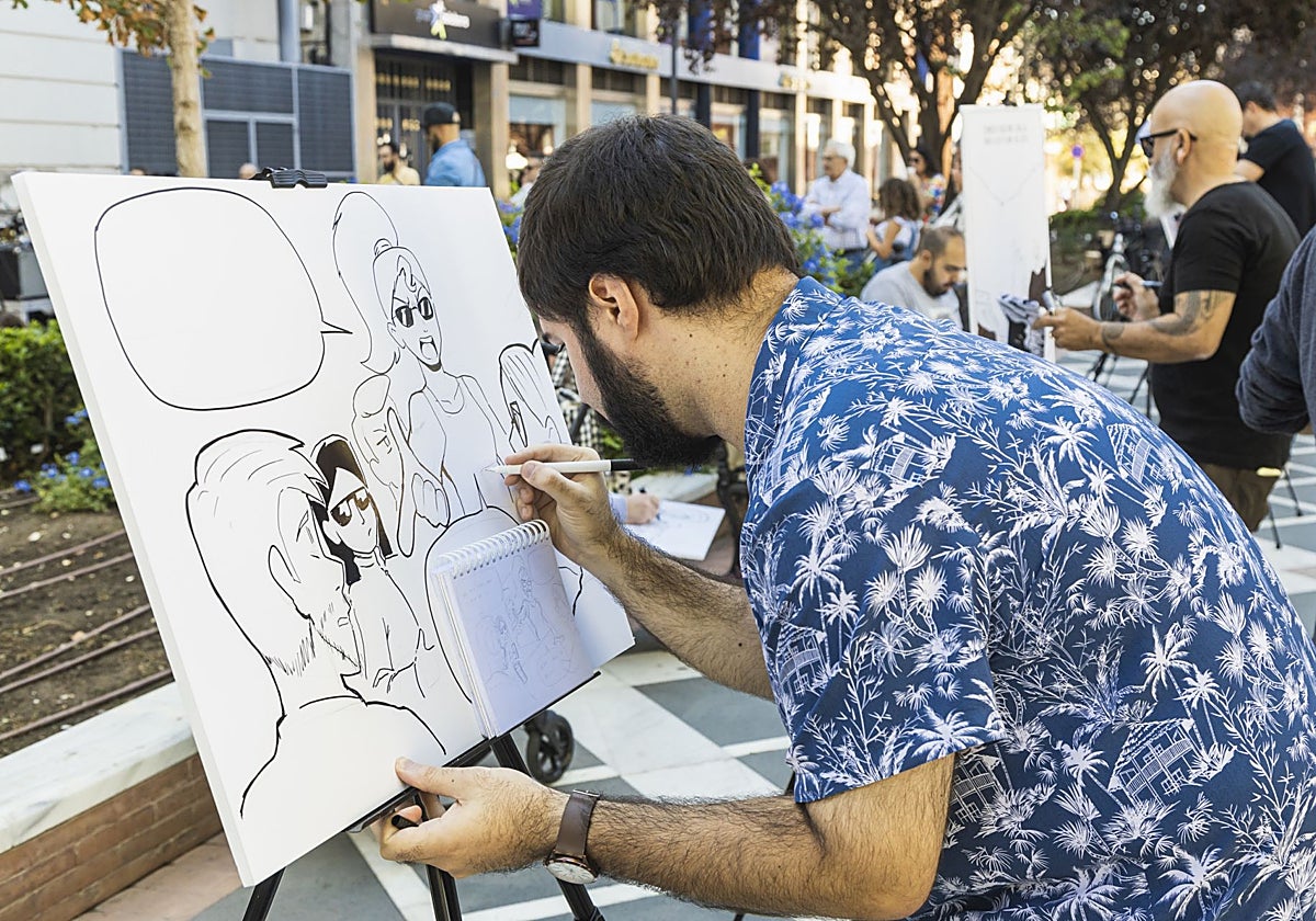 César Iglesias, de Badajoz, dibuja su viñeta en San Francisco.