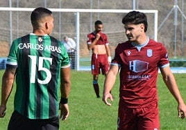 Álex Galán y Carlos Arias en el duelo de este domingo entre el Jerez y el Badajoz.