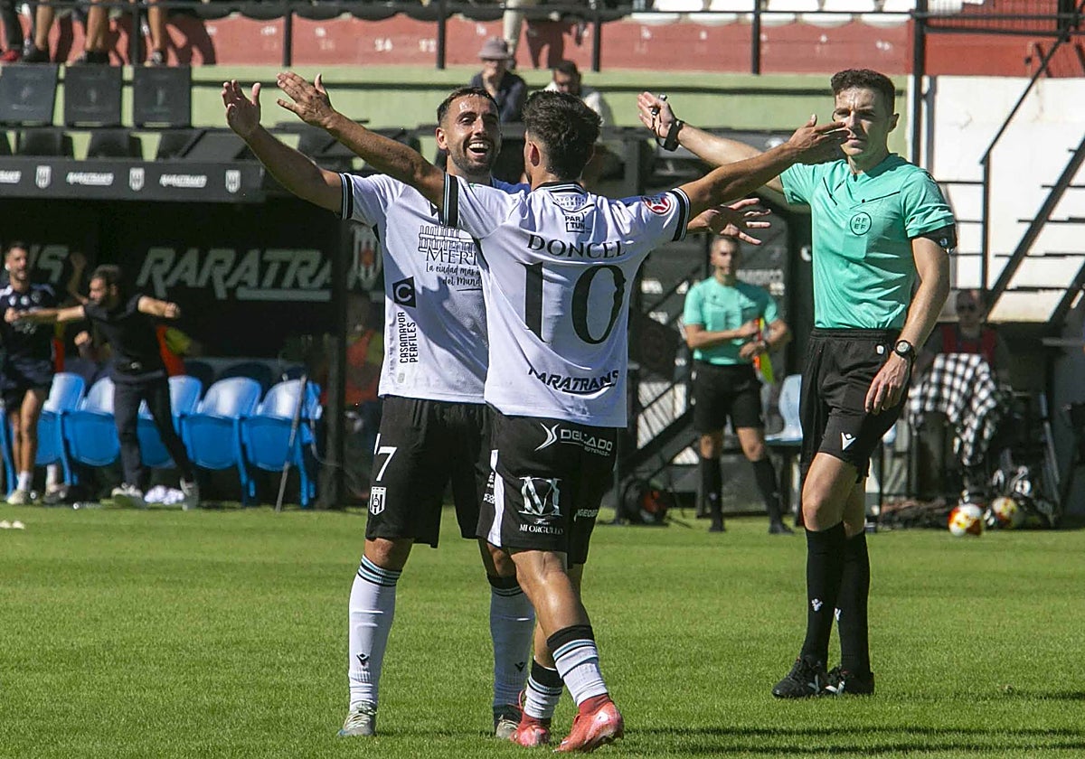 Chiqui y Doncel celebrando en el Romano.