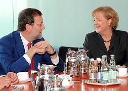 Mariano Rajoy y Angela Merkel en una reunión en 2008. / Archivo