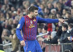 Piqué, durante el partido del sábado contra el Sporting/ Albert Gea (Reuters).