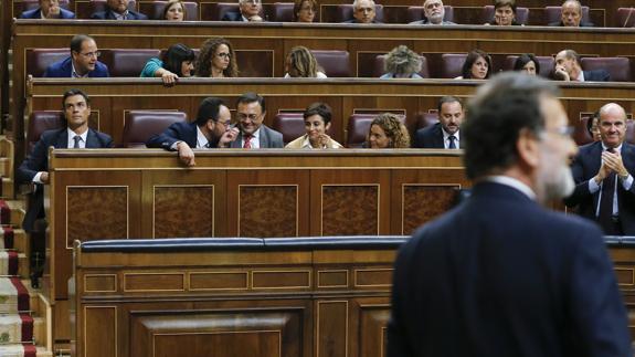 Mariano Rajoy y Pedro Sánchez al término de la votación.