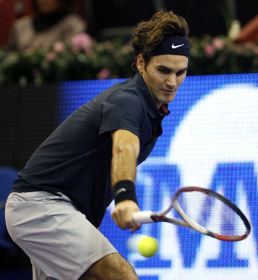 Federer durante su partido con el estadounidense Ginepri. / EFE