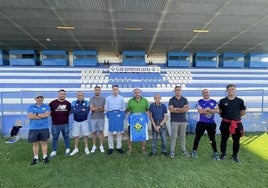 Rerpesentantes de ambas entidades tras la firma del acuerdo