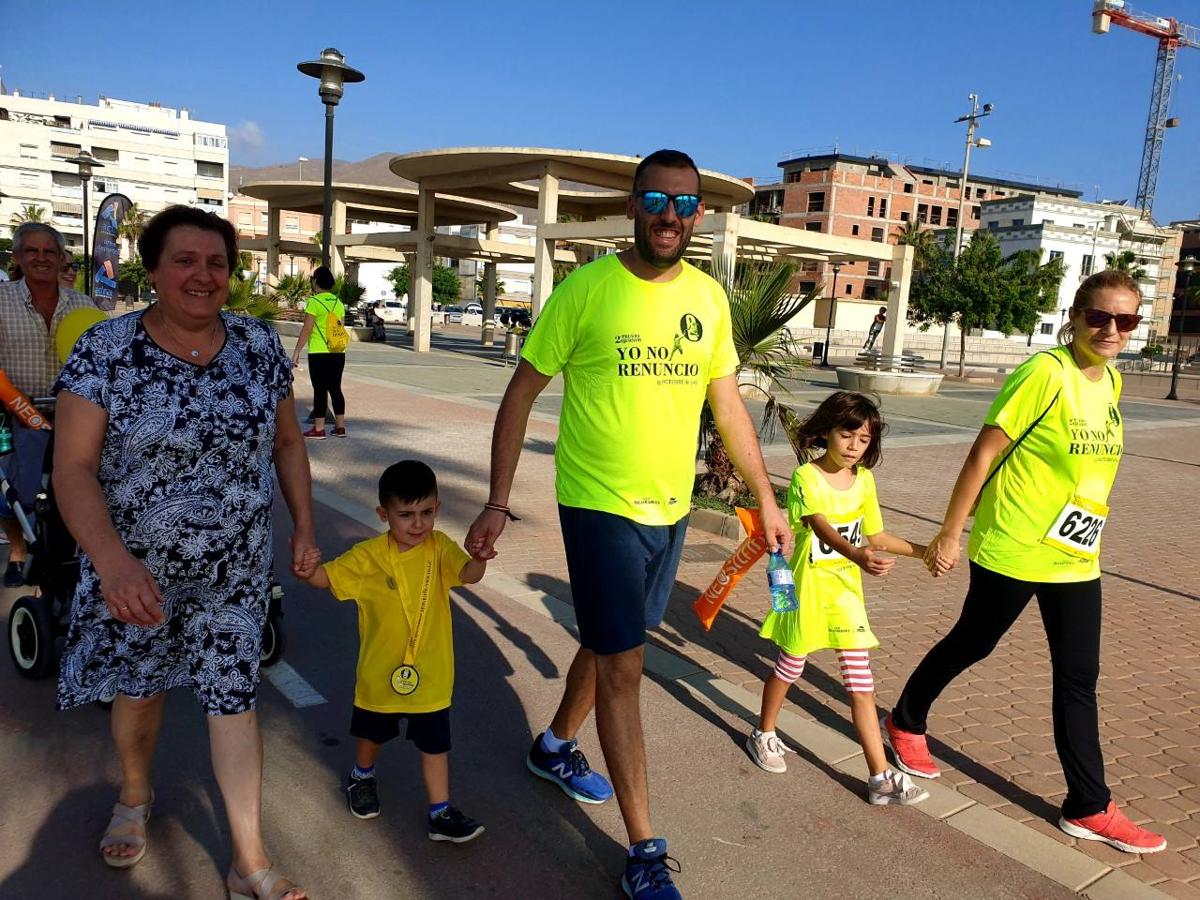 Alrededor de 120 personas han salido hoy a la calle para denunciar que conciliar trabajo y familia es una carrera de obstáculos diaria