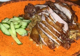 Un poco de pato con arroz en Noodle Rest o comer de cine